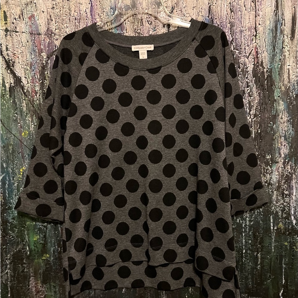 Boat neck sweater.